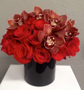 Midnight in Paris: black magic roses, cymbidium orchid floral design