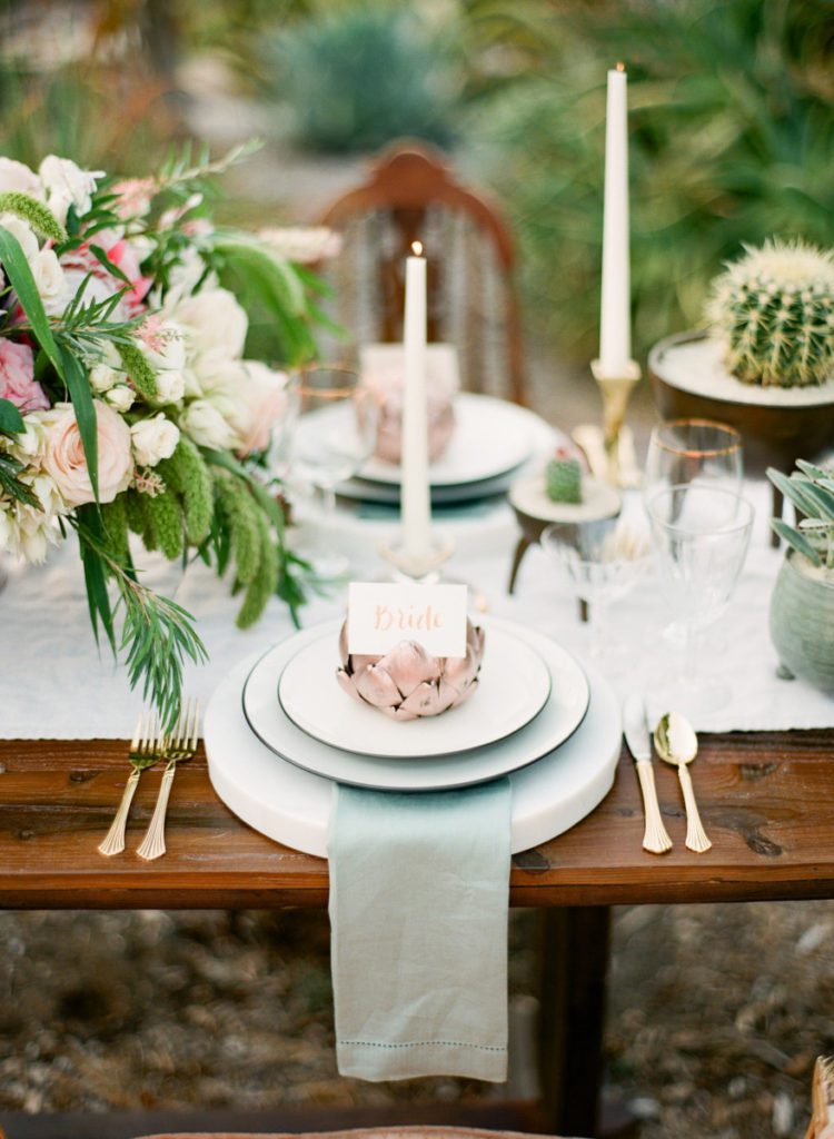 Photo of artichoke wedding table plate setting.